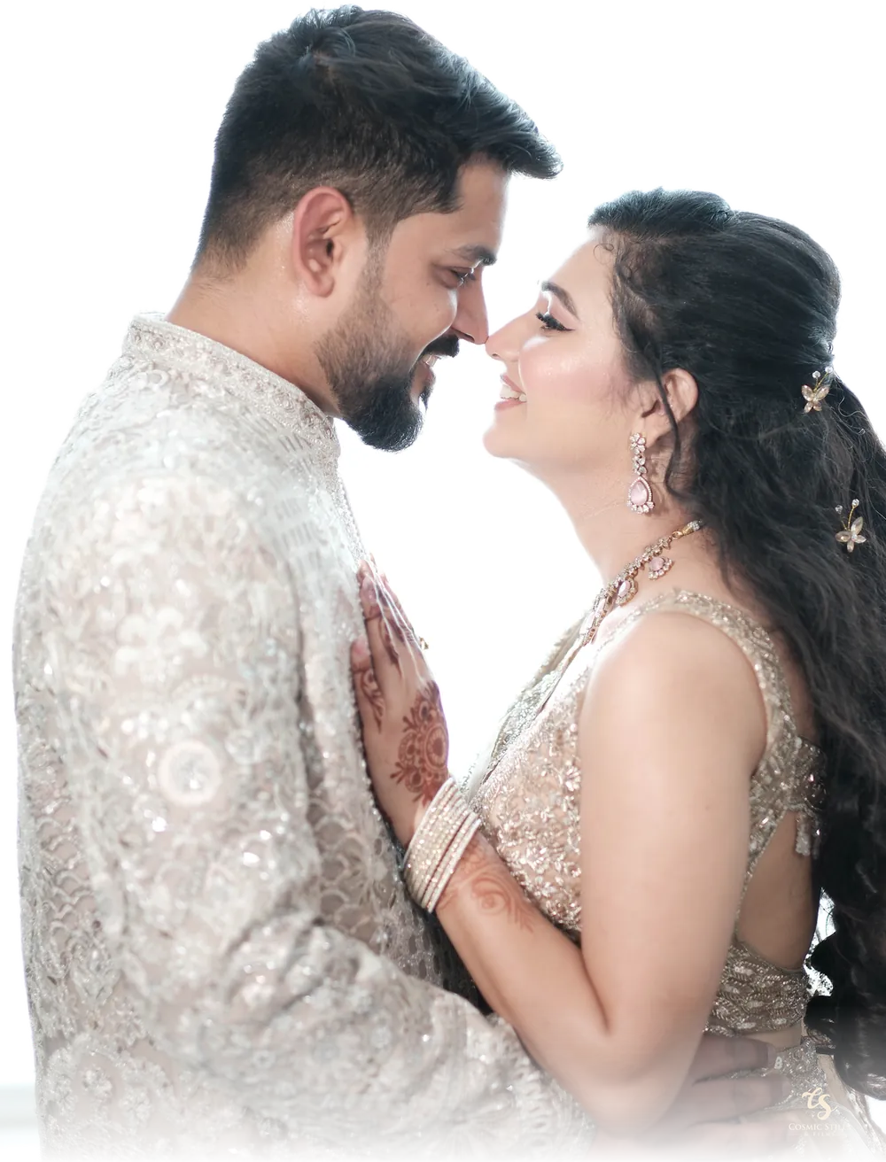 Akshay and Nishtha, forehead to forehead, smiling