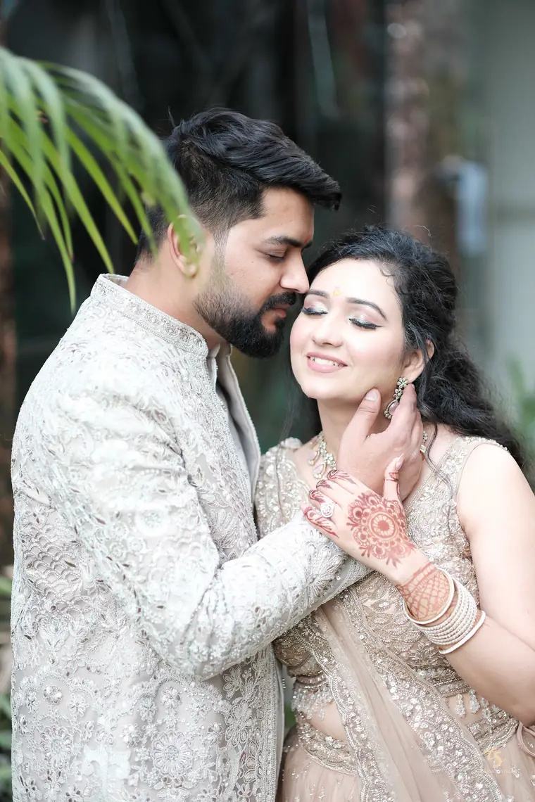 Akshay gently holding Nishtha's face, foreheads touching